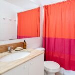 Bathroom_with_red_shower_curtain_202607161839